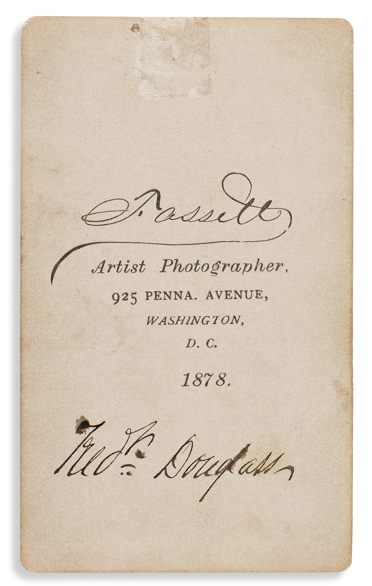 (FREDERICK DOUGLASS.) Samuel M. Fassett, photographer. Scarce carte de visite portrait of Douglass, with his signature on verso.